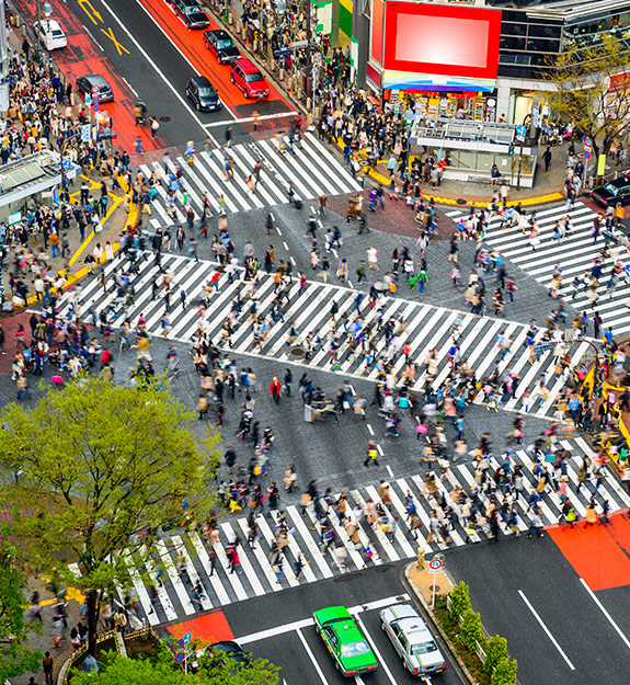 Many people walking in the streets of Tokyo.